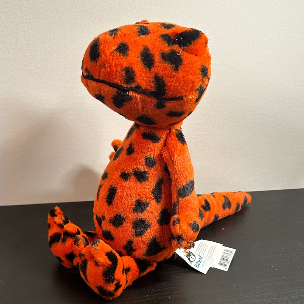 rare/retired jellycat Orange and Black Plush Dinosaur Toy